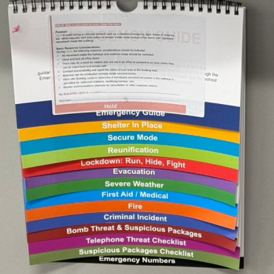 Binder with emergency response plans for a school