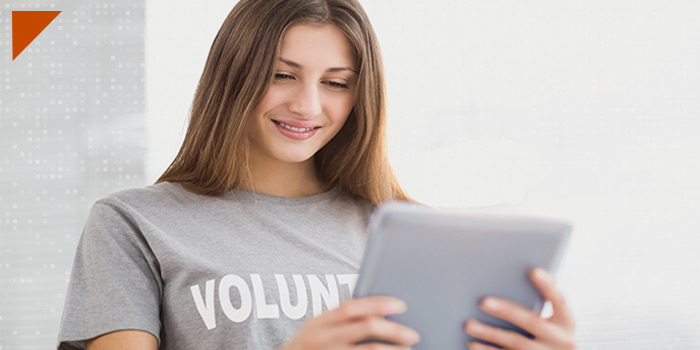 female volunteer using tablet